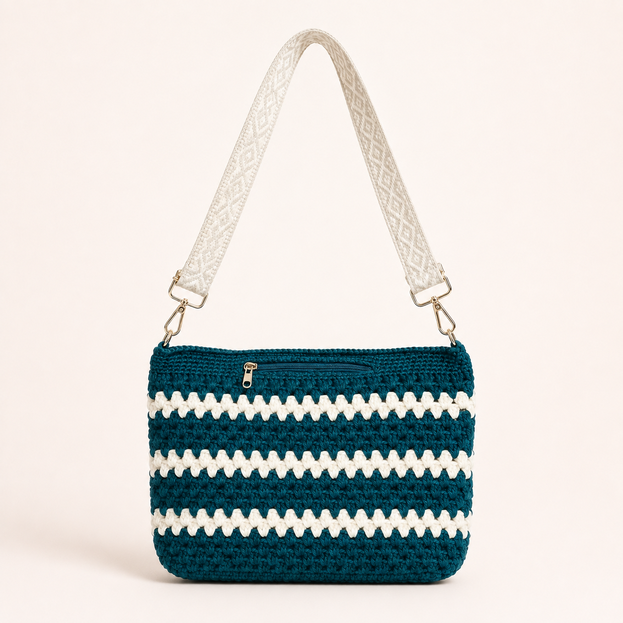 Teal and ivory striped crochet crossbody bag with woven jacquard strap